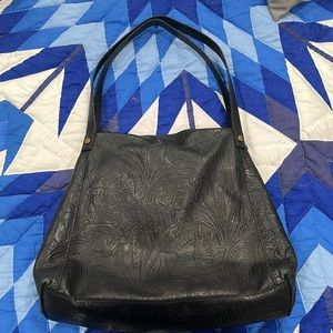Embossed black leather bag